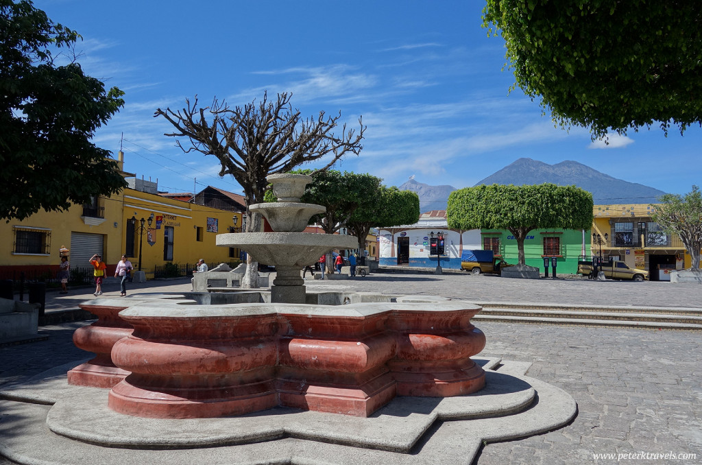 Square with Volcan Fuego in the distant background.