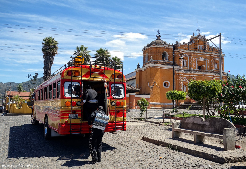 Band members board a chicken bus, San Pedro Las Huertas