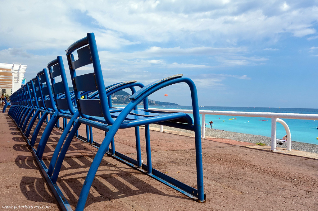 Blue chairs along Nice's Promenade des Anglais