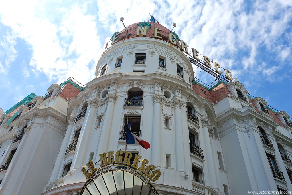 The Hotel Negresco sits across from the beach