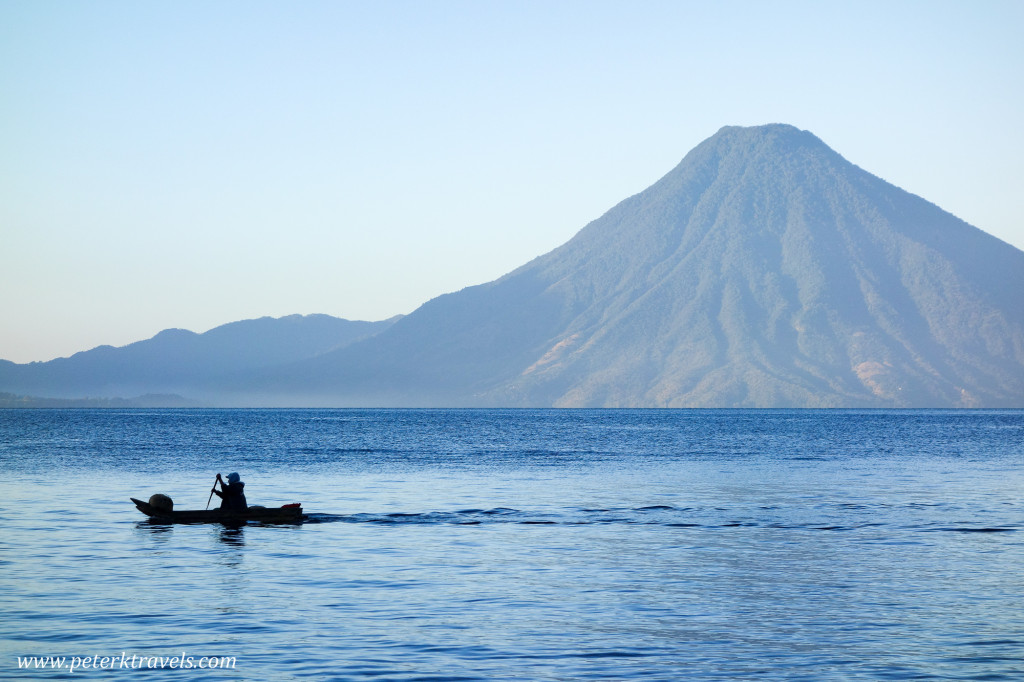 Early morning fisherman with Volcan San Pedro, Lake Atitlan, Guatemala