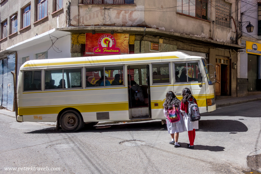 Students wait for a Nissan bus, Potosi